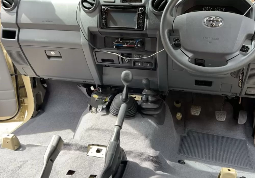 Seats removed from troopy before carpet removal 